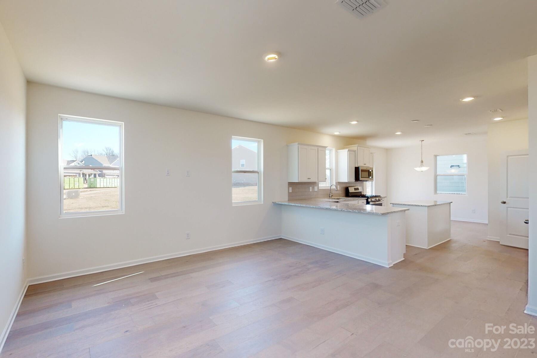 2650 Trinity Street Monroe, NC 28110 - Photo 13 of 36 a view of kitchen and windows