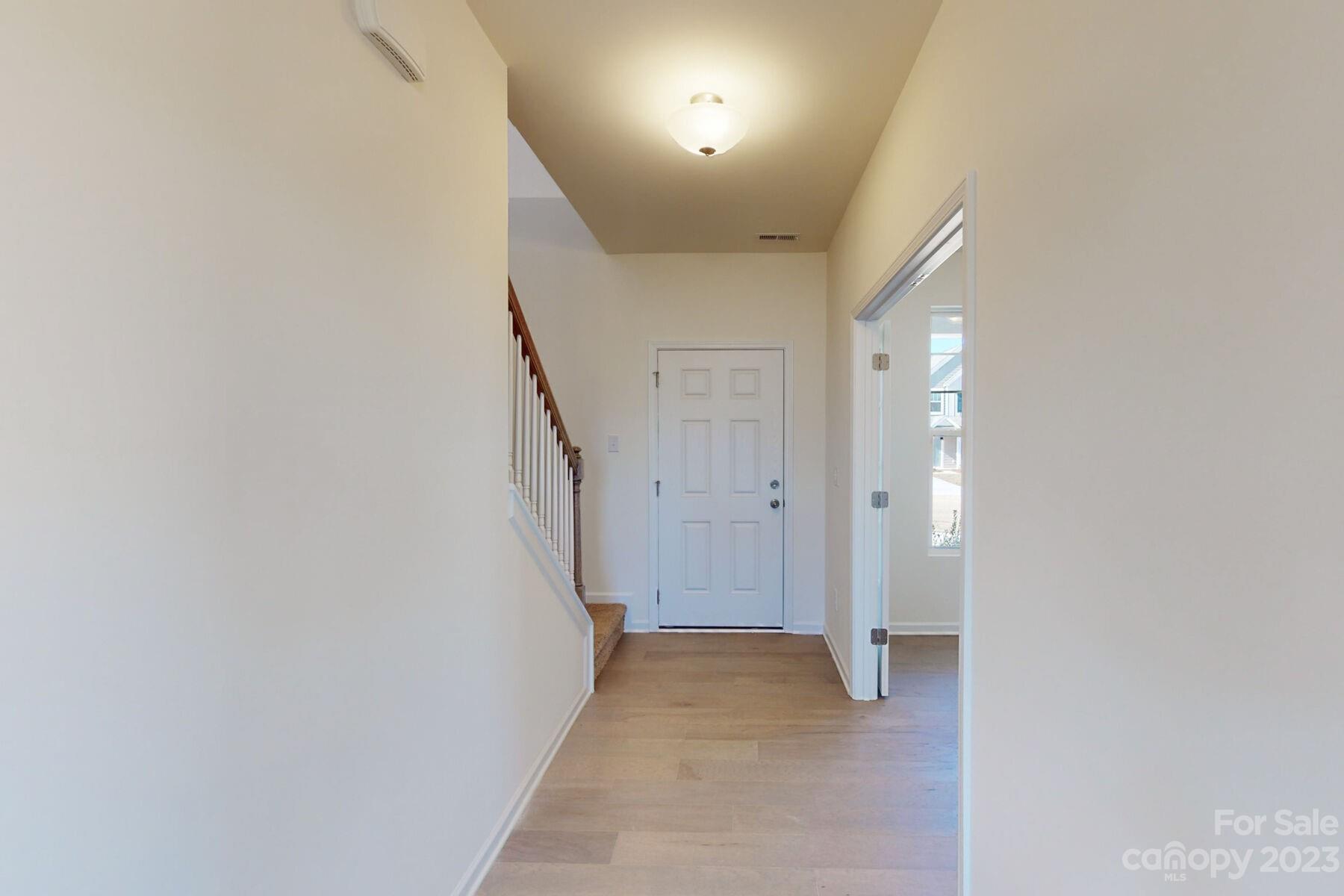 2650 Trinity Street Monroe, NC 28110 - Photo 14 of 36 a view of a hallway with staircase