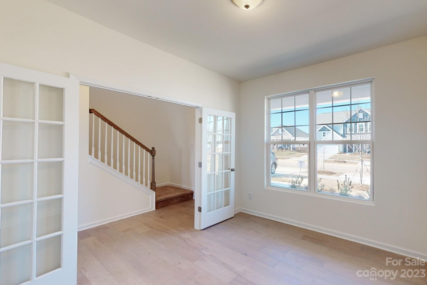 2650 Trinity Street Monroe, NC 28110 - Photo 16 of 36 an empty room with windows