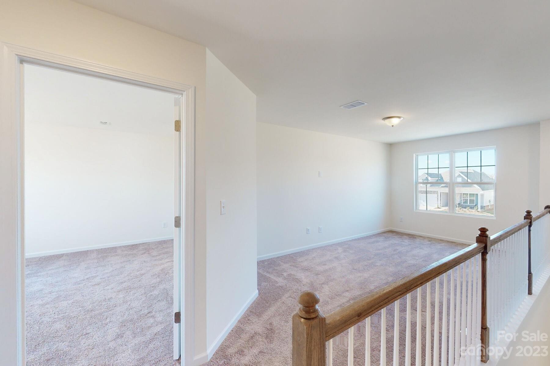 2650 Trinity Street Monroe, NC 28110 - Photo 19 of 36 a view of a hallway to a room with windows
