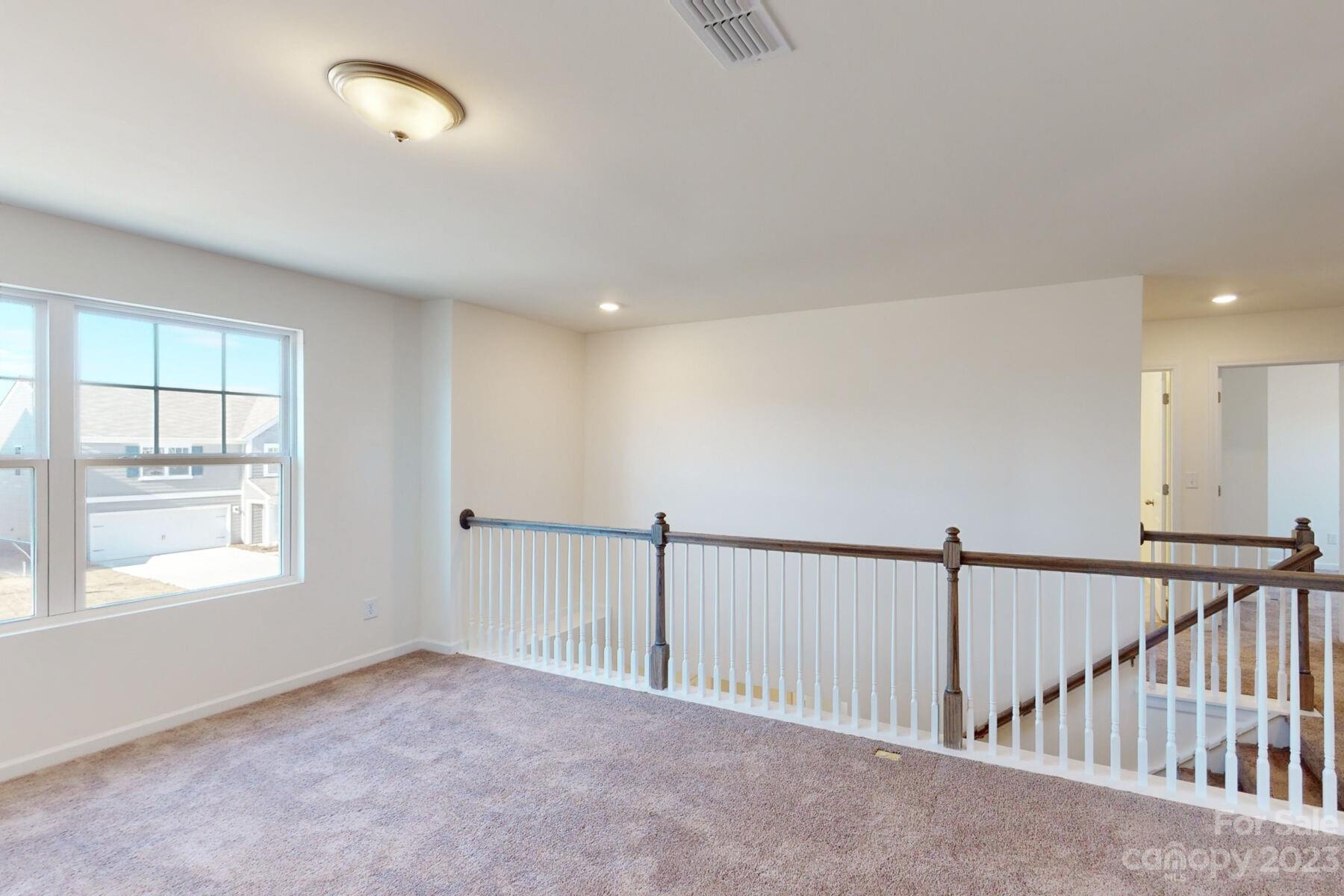 2650 Trinity Street Monroe, NC 28110 - Photo 20 of 36 a view of an empty room with a window