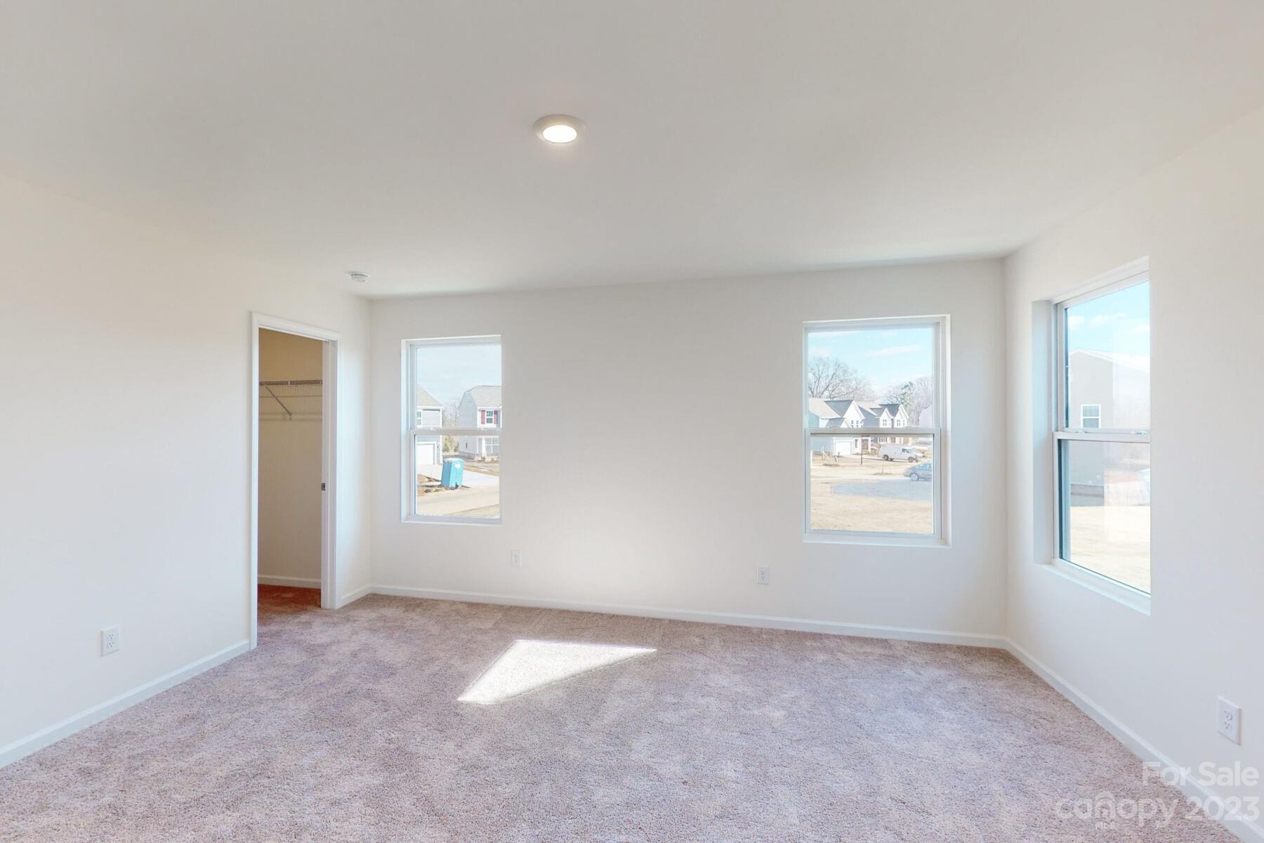 2650 Trinity Street Monroe, NC 28110 - Photo 27 of 36 an empty room with windows