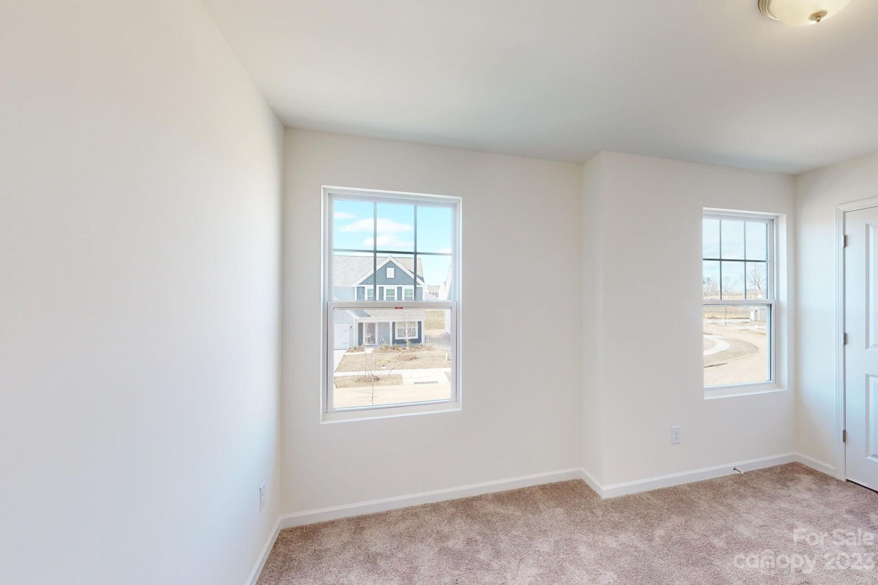 2650 Trinity Street Monroe, NC 28110 - Photo 31 of 36 an empty room with windows