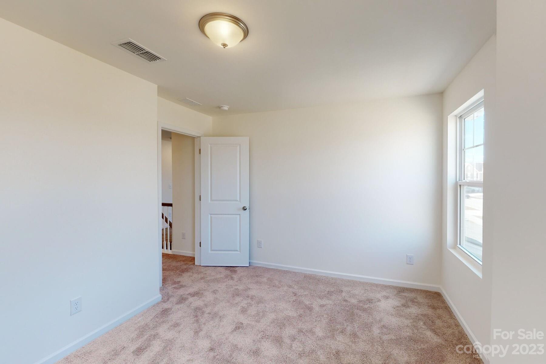 2650 Trinity Street Monroe, NC 28110 - Photo 33 of 36 a view of an empty room and a window