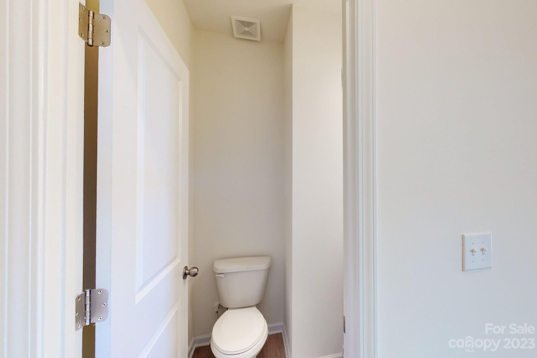 2650 Trinity Street Monroe, NC 28110 - Photo 6 of 36 a white toilet sitting next to a shower