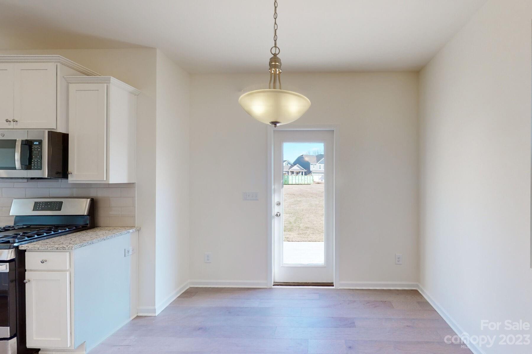 2650 Trinity Street Monroe, NC 28110 - Photo 7 of 36 a view of an empty room with a window