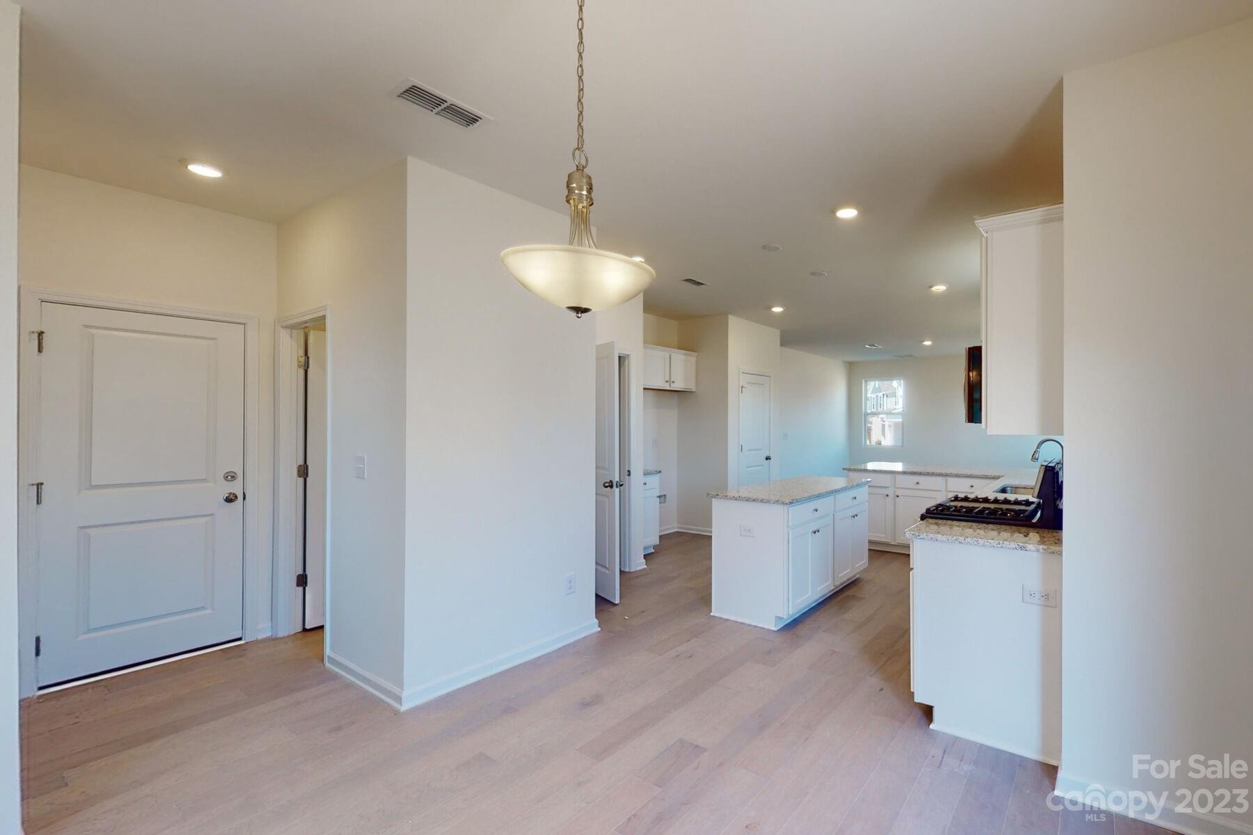 2650 Trinity Street Monroe, NC 28110 - Photo 9 of 36 a large kitchen with a lot of counter space and appliances