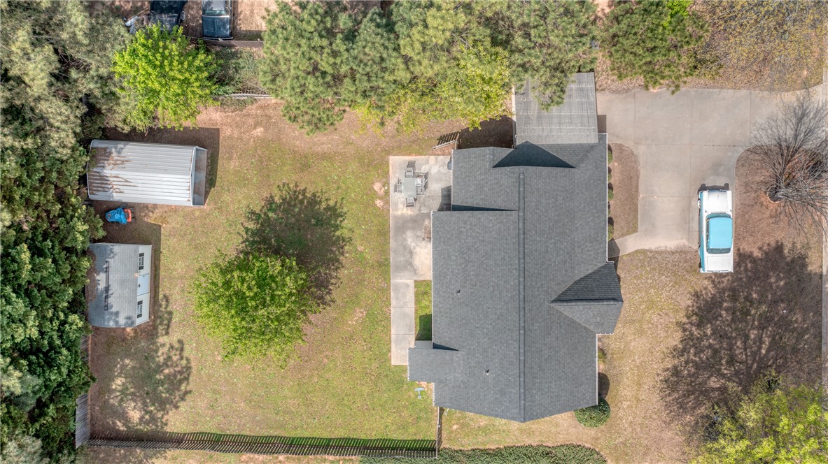102 Hawk Ridge Drive Anderson, SC 29621 - Photo 30 of 38 An aerial perspective reveals a residence with a spacious yard and various outbuildings.