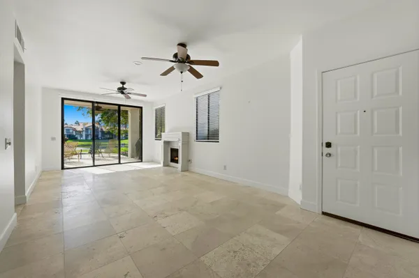 a view of empty room with windows