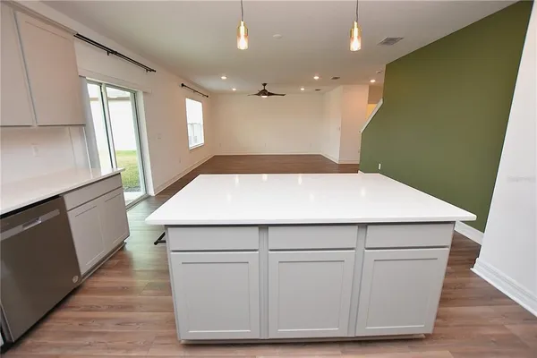 a view of entryway with wooden floor