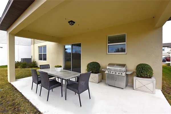 a bedroom with bed and a window