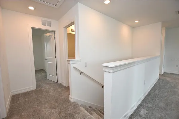 a view of a room with racks on the wall