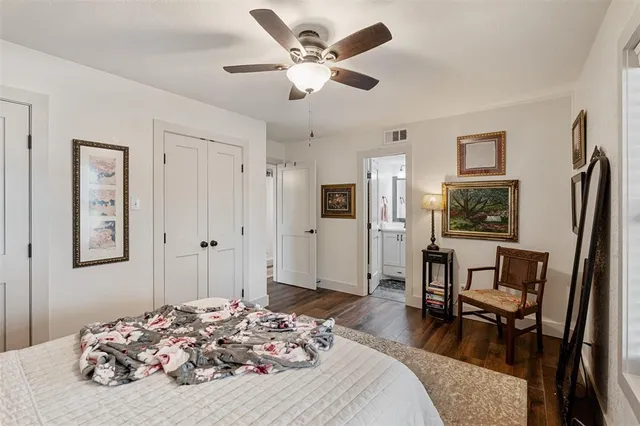 a bedroom with a bed furniture and a window