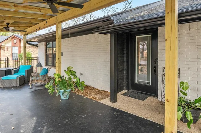 a view of a porch with seating space