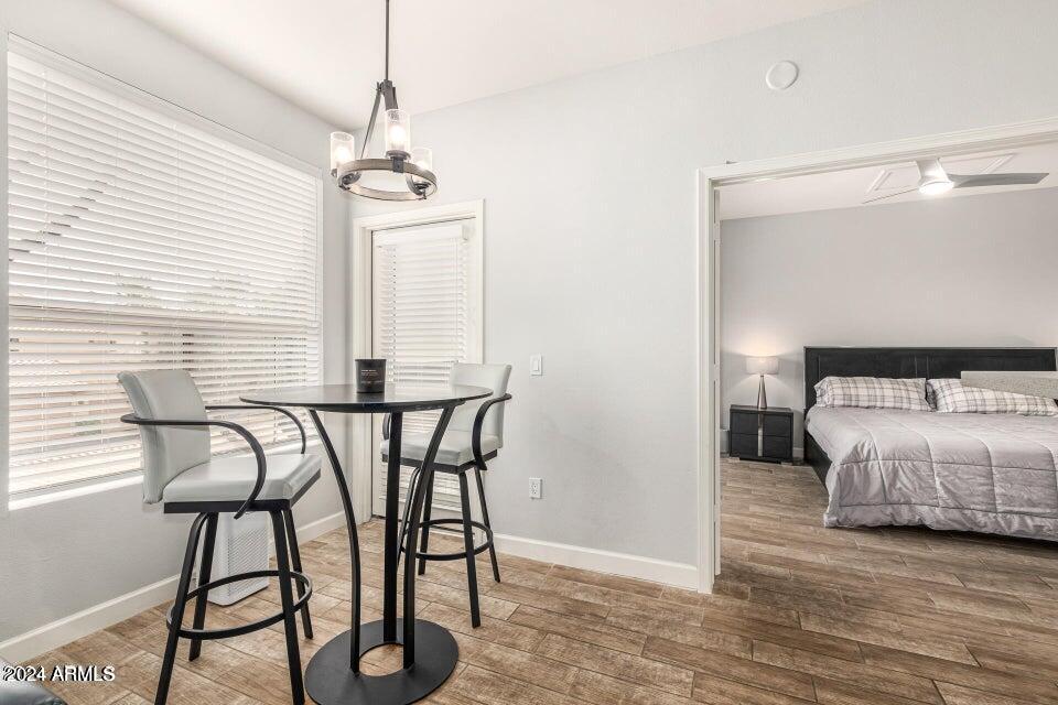 9550 East Thunderbird Road, Unit 266 Scottsdale, AZ 85260 - Photo 14 of 35 a bedroom with a bed and a window