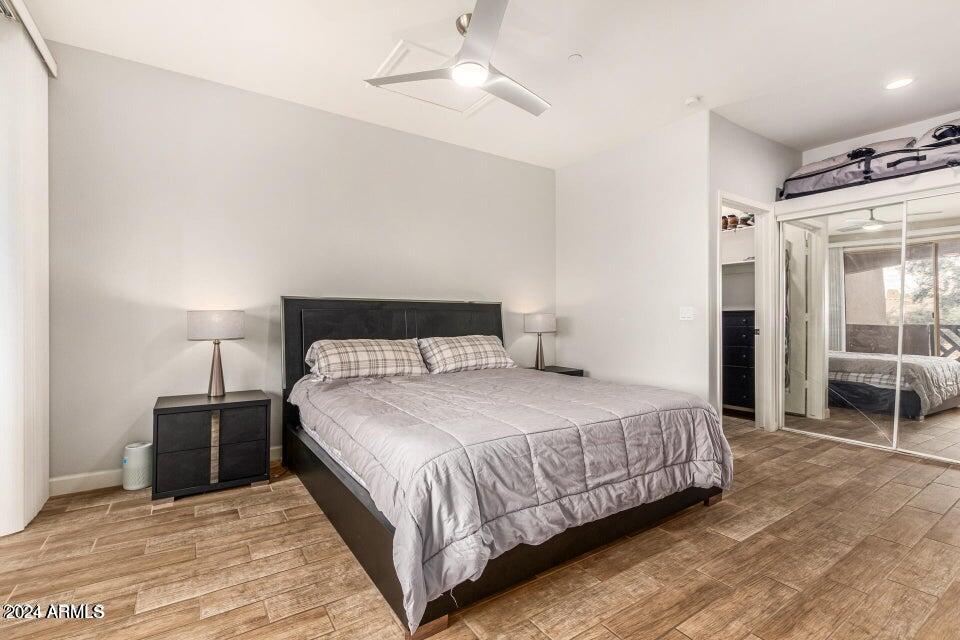 9550 East Thunderbird Road, Unit 266 Scottsdale, AZ 85260 - Photo 15 of 35 a bedroom with a bed and a table