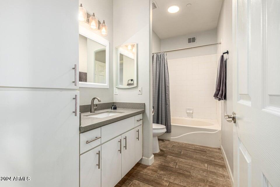 9550 East Thunderbird Road, Unit 266 Scottsdale, AZ 85260 - Photo 19 of 35 a bathroom with a granite countertop sink toilet and shower