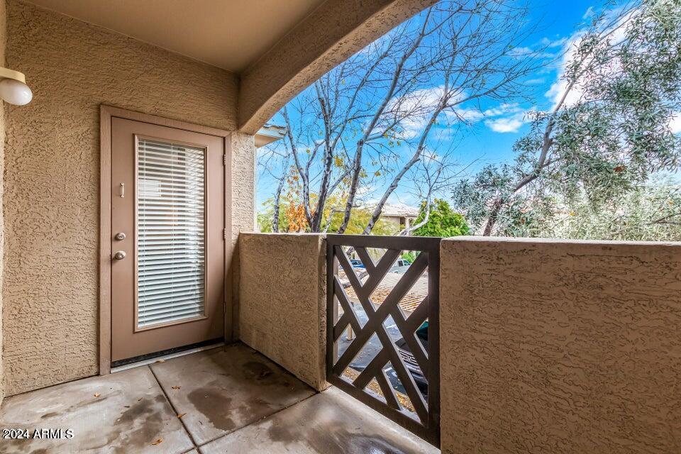 9550 East Thunderbird Road, Unit 266 Scottsdale, AZ 85260 - Photo 26 of 35 a side view of a porch