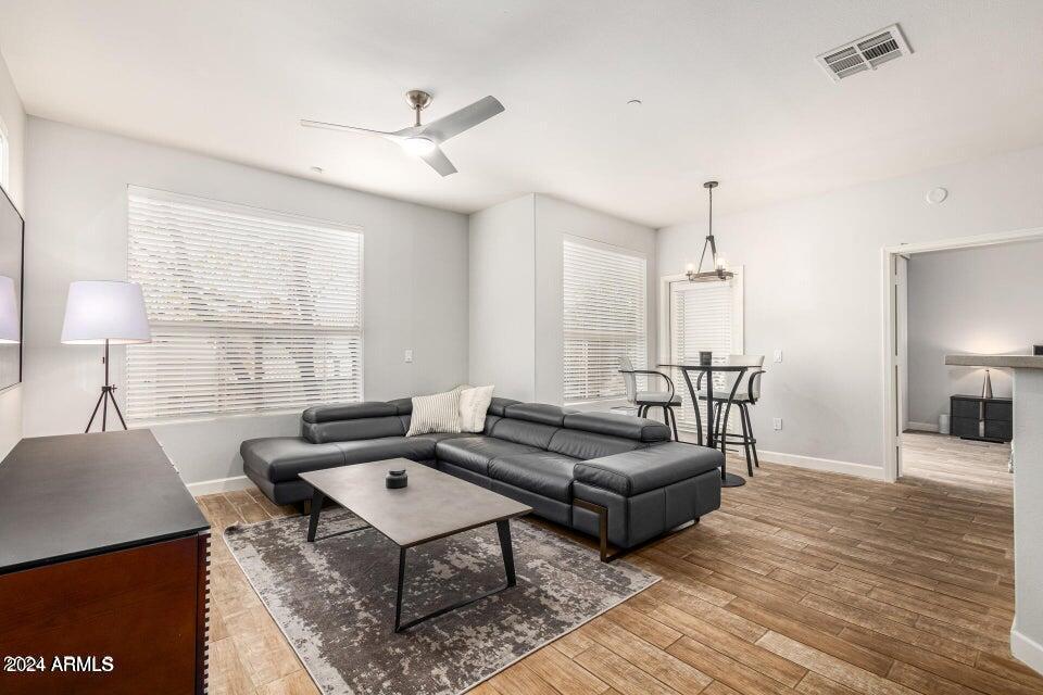 9550 East Thunderbird Road, Unit 266 Scottsdale, AZ 85260 - Photo 6 of 35 a living room with furniture and a window