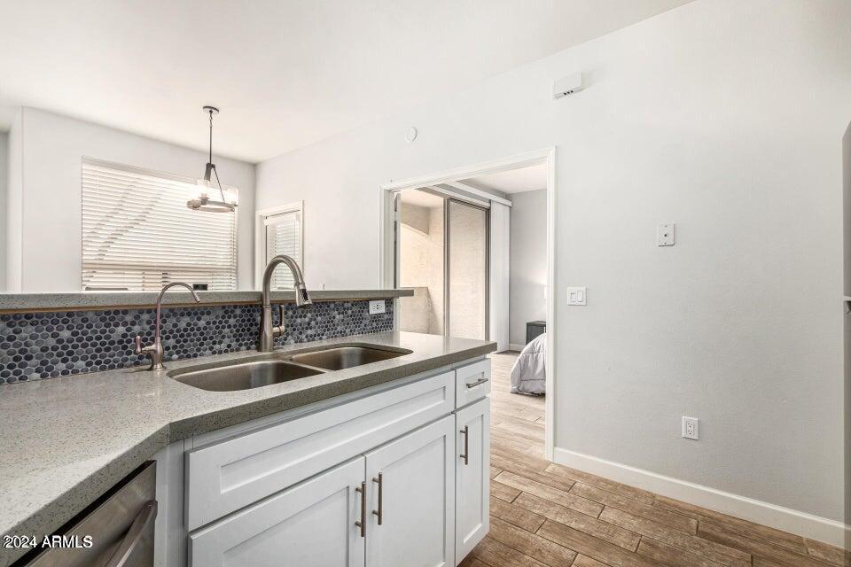 9550 East Thunderbird Road, Unit 266 Scottsdale, AZ 85260 - Photo 10 of 35 a bathroom with a sink and a mirror