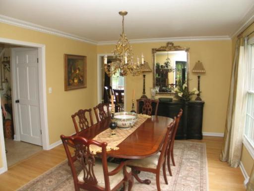 170 North Valley Road Barrington, IL 60010 - Photo 4 of 8 a view of a dining room with furniture and chandelier