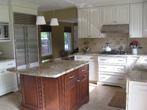 170 North Valley Road Barrington, IL 60010 - Photo 5 of 8 a kitchen with kitchen island granite countertop a sink cabinets and stainless steel appliances