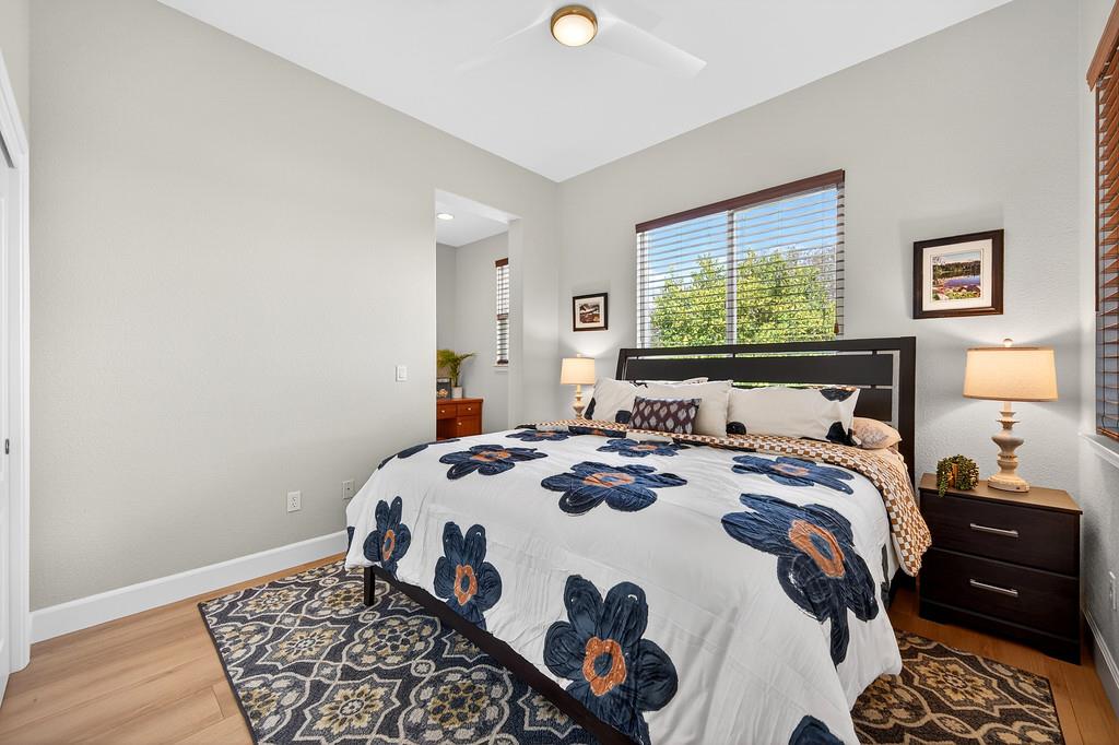 2208 Raintree Court Rocklin, CA 95765 - Photo 18 of 46 a bed sitting in a bedroom next to a window