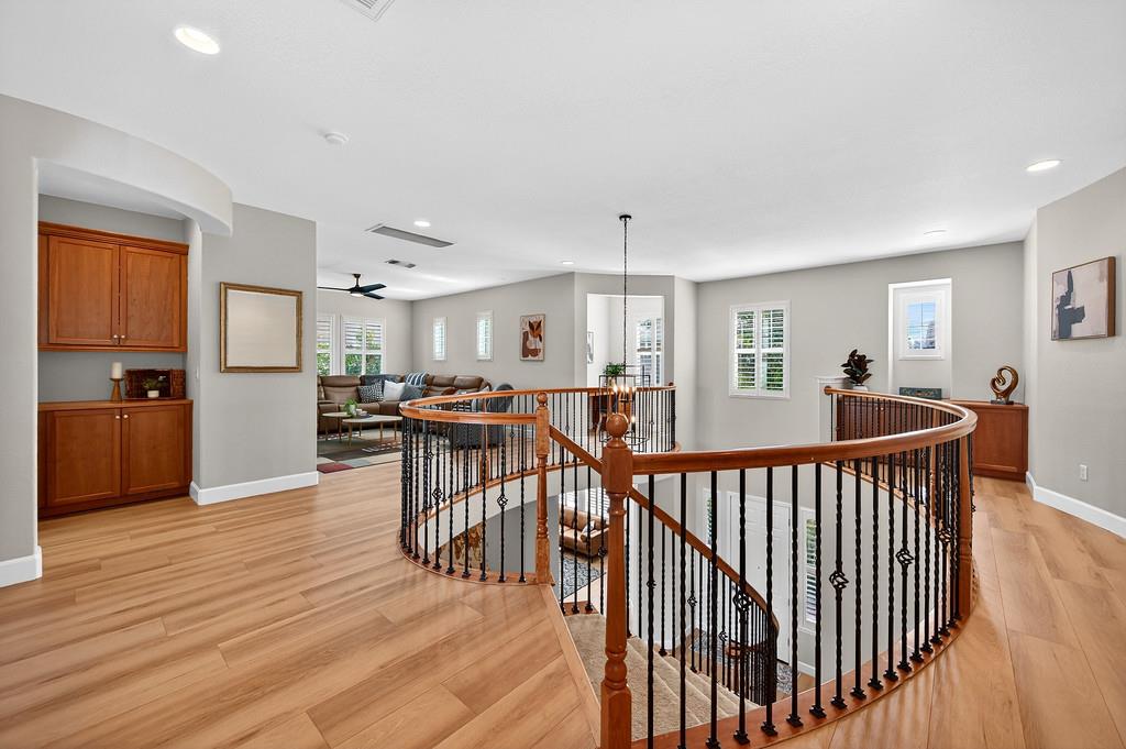 2208 Raintree Court Rocklin, CA 95765 - Photo 20 of 46 a view of a dining room with furniture window and wooden floor