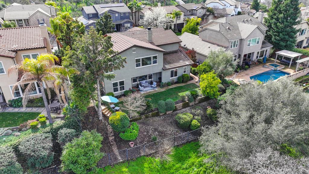 2208 Raintree Court Rocklin, CA 95765 - Photo 2 of 46 an aerial view of a house with a garden and plants