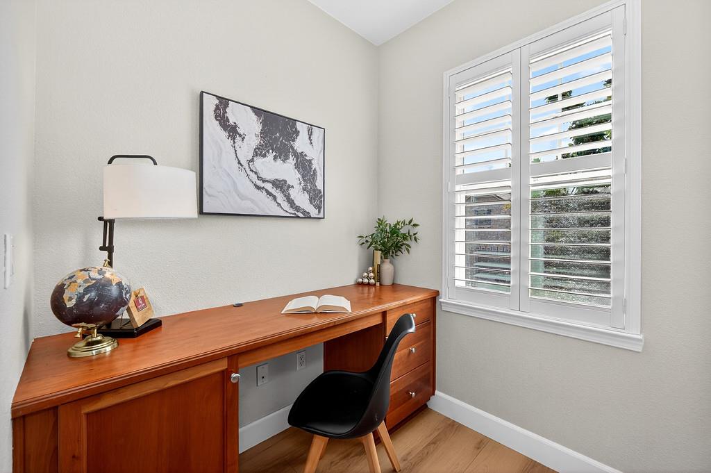 2208 Raintree Court Rocklin, CA 95765 - Photo 23 of 46 a view of a workspace with furniture and a window