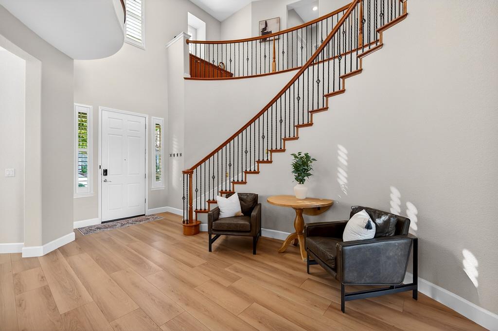2208 Raintree Court Rocklin, CA 95765 - Photo 4 of 46 a living room with furniture and wooden floor