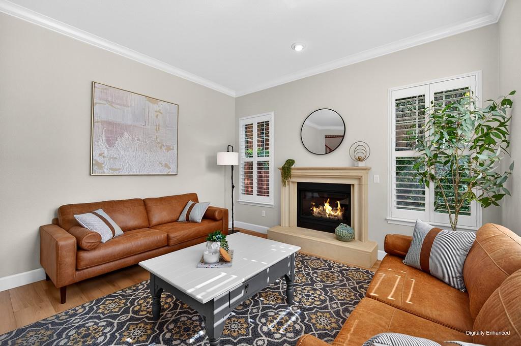 2208 Raintree Court Rocklin, CA 95765 - Photo 7 of 46 a living room with furniture a large window and a fireplace