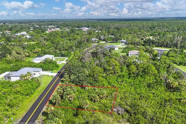 a view of a yard with an outdoor space