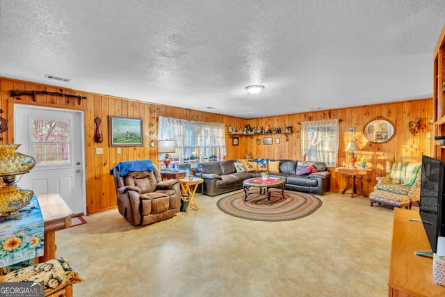 a bedroom with a bed and furniture