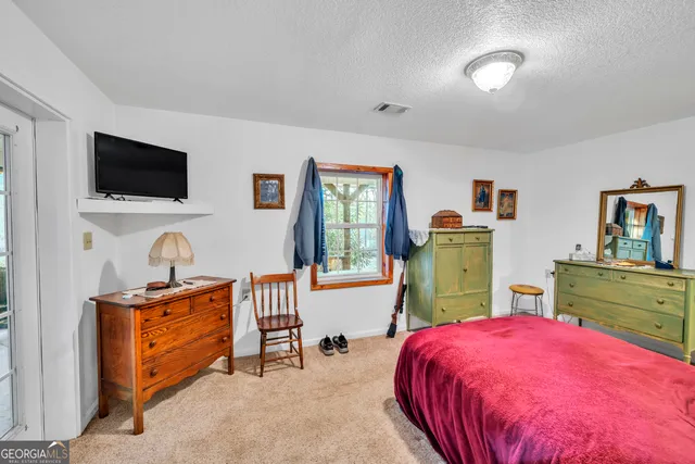 a view of a yard with an outdoor space