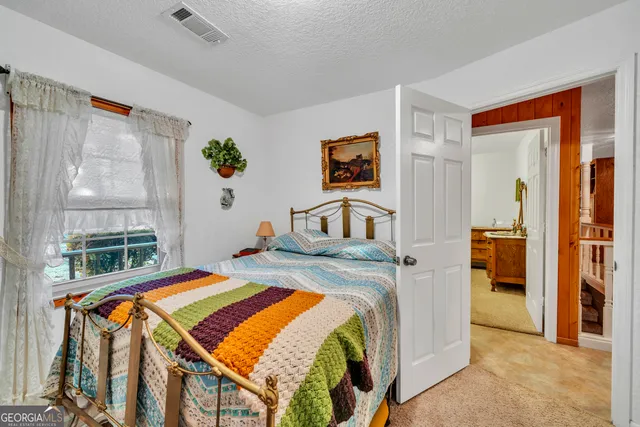 a front view of a house with yard