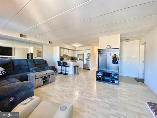 a living room with furniture and a couch