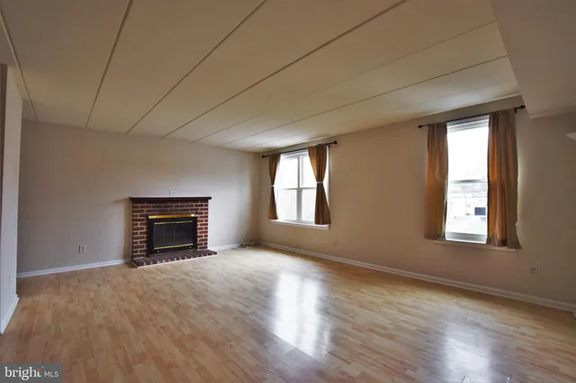 an empty room with windows