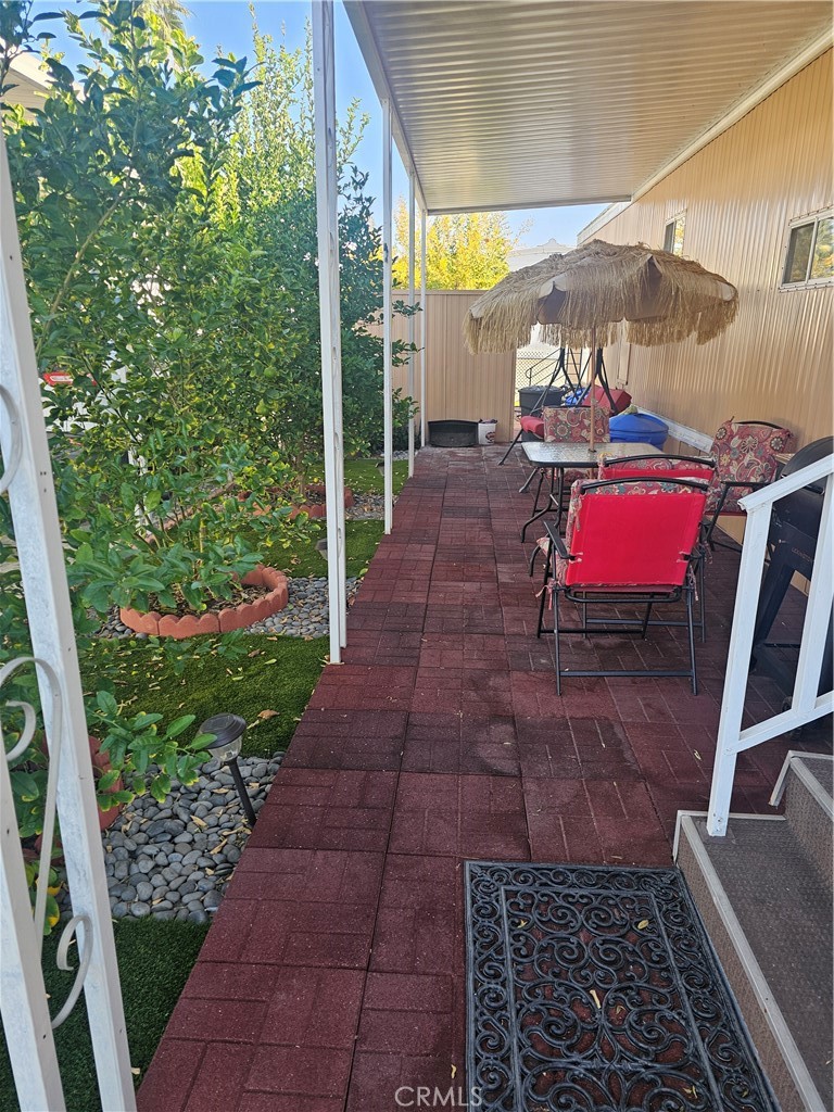 206 Lyon, Unit 109 Hemet, CA 92545 - Photo 4 of 11 a view of yard with patio