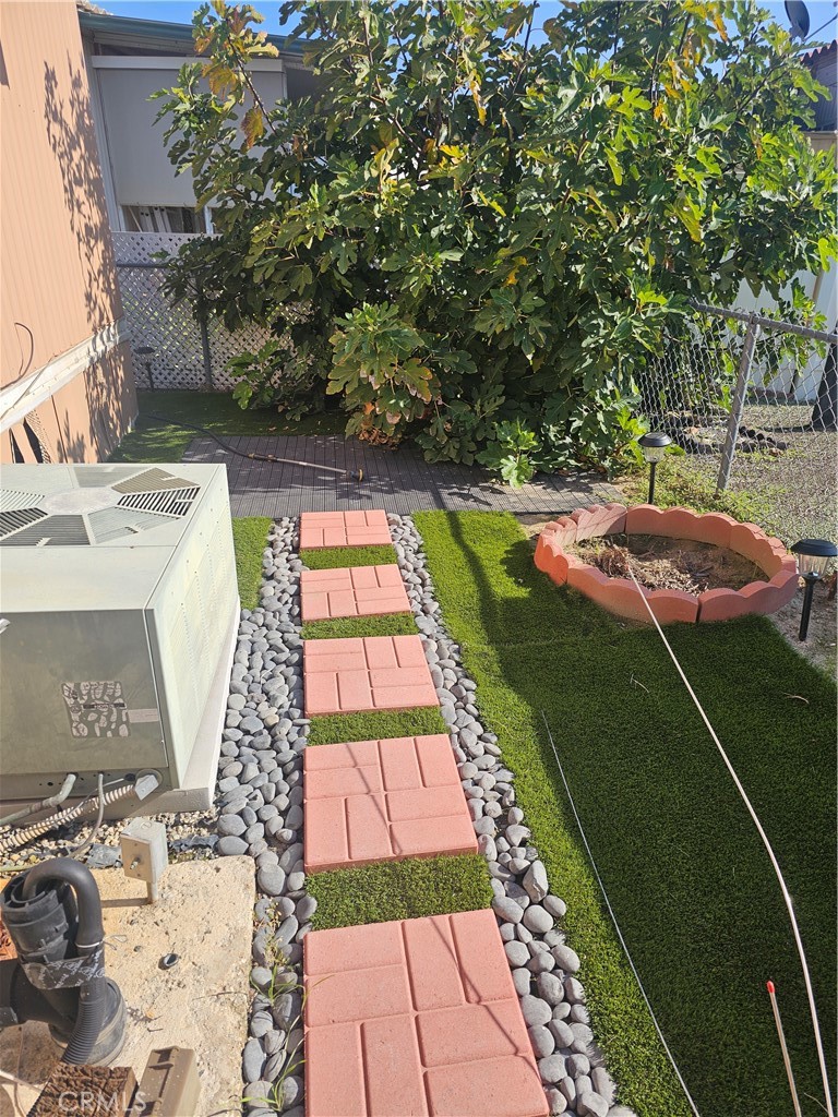 206 Lyon, Unit 109 Hemet, CA 92545 - Photo 9 of 11 a view of swimming pool with a backyard