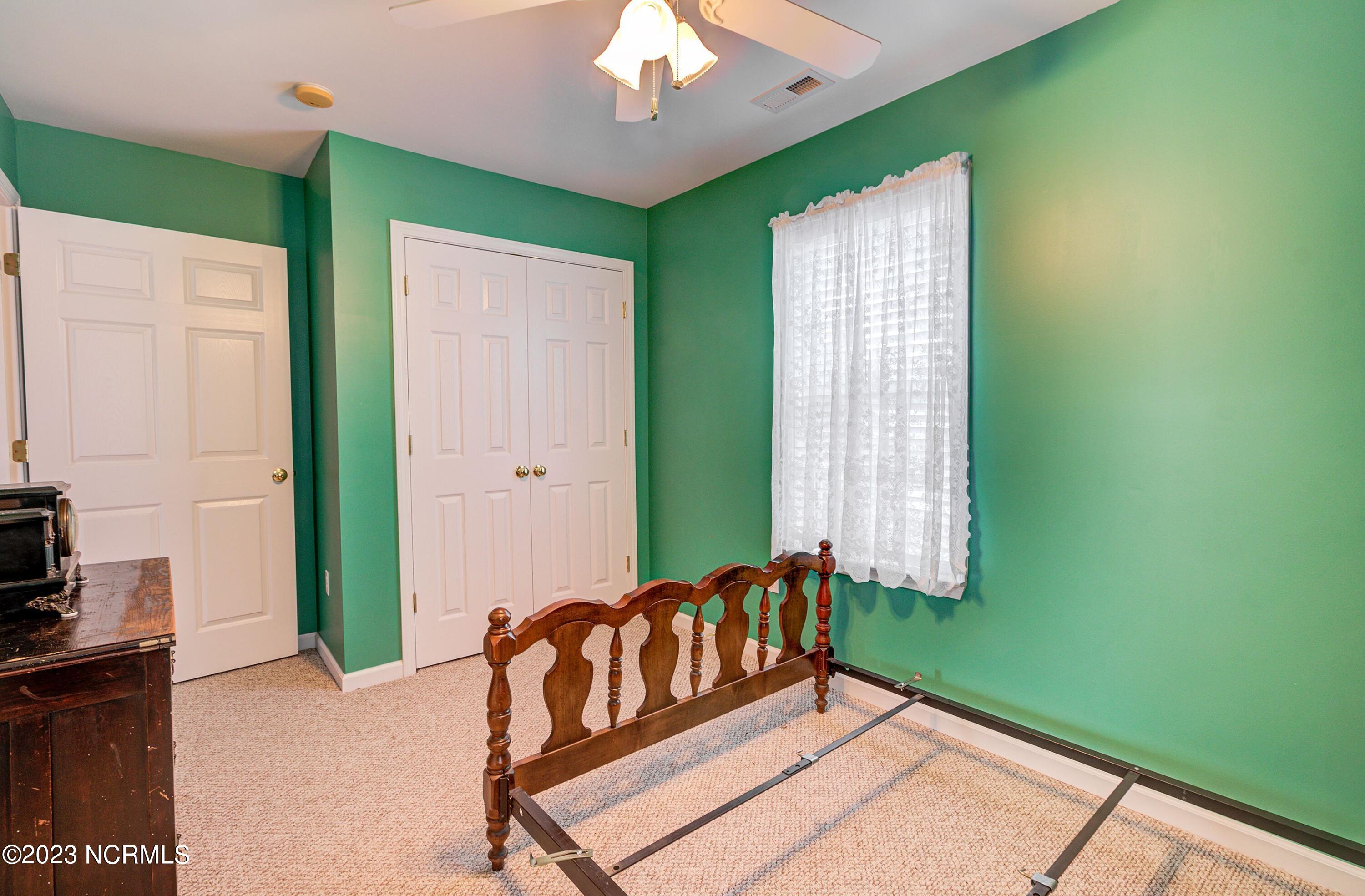 1116 Fillmore Road Southport, NC 28461 - Photo 26 of 44 Upstairs Front Bedroom