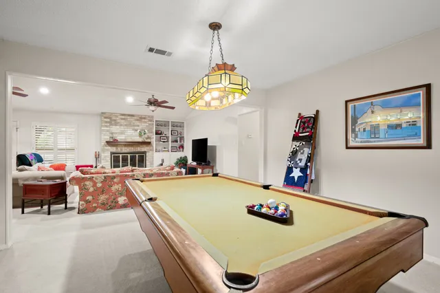 a living room with furniture and a table