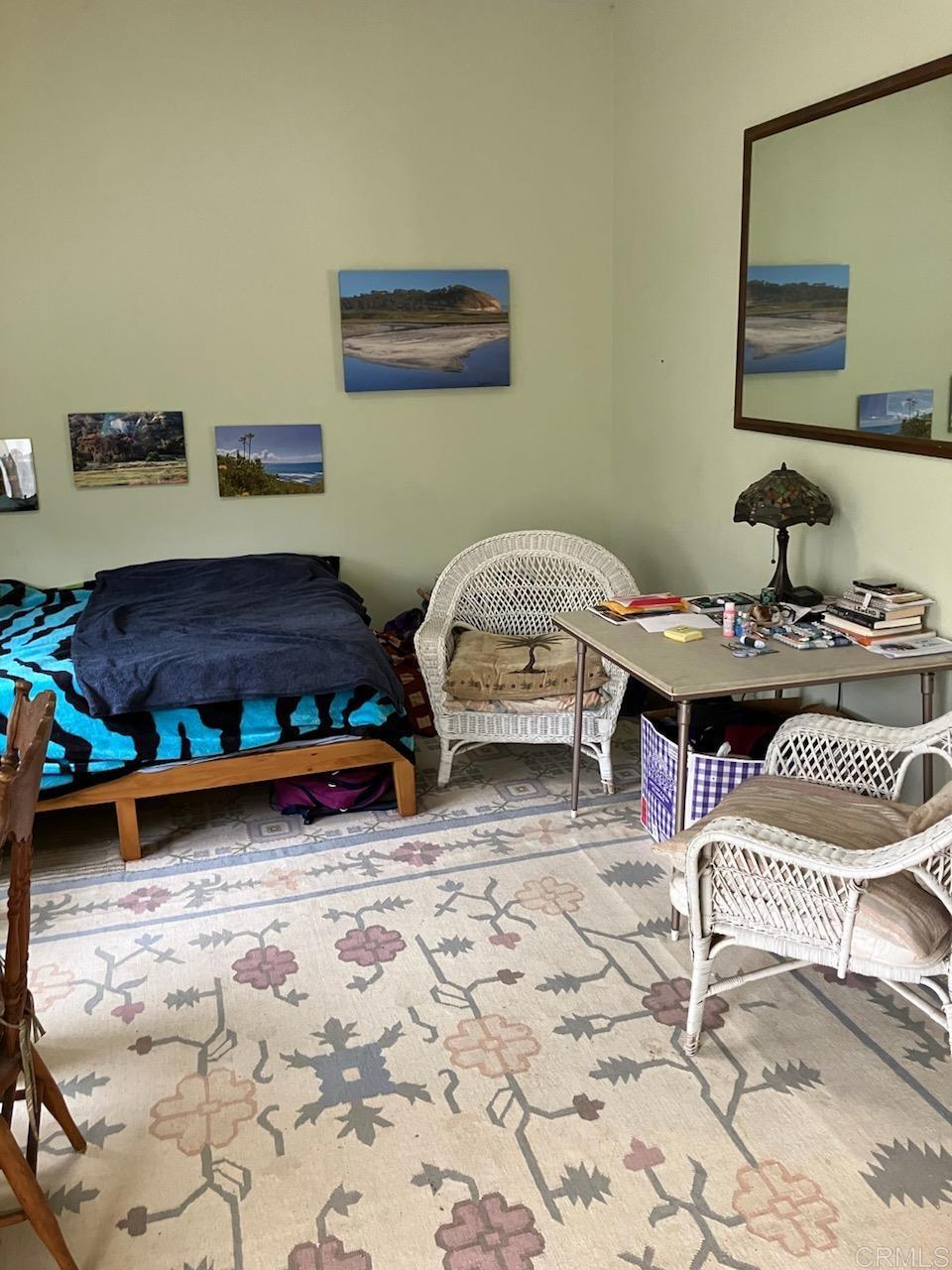 18525 Aliso Canyon Road Rancho Santa Fe, CA 92091 - Photo 14 of 16 a living room with furniture and wooden floor