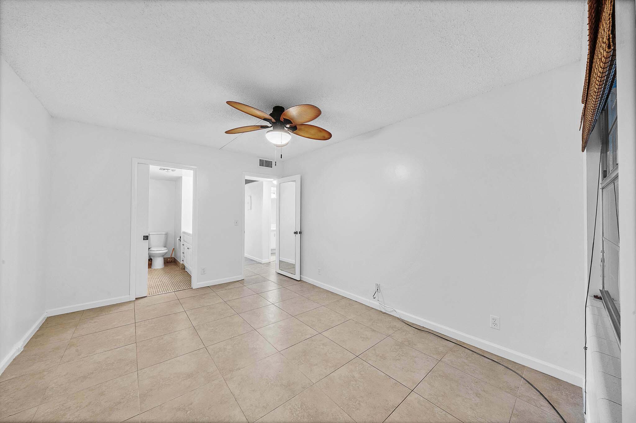 2049 Hythe A Boca Raton, FL 33434 - Photo 19 of 38 9 Primary Bedroom (3)