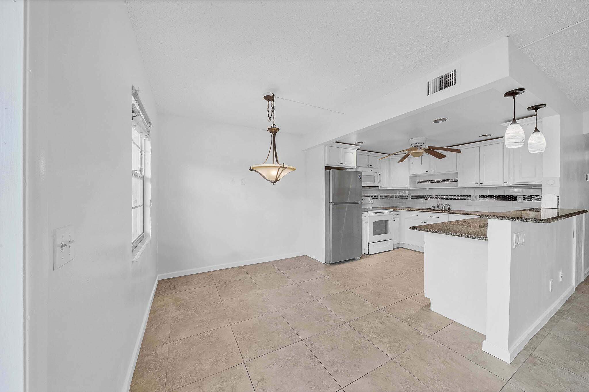 2049 Hythe A Boca Raton, FL 33434 - Photo 7 of 38 5 Kitchen (1)
