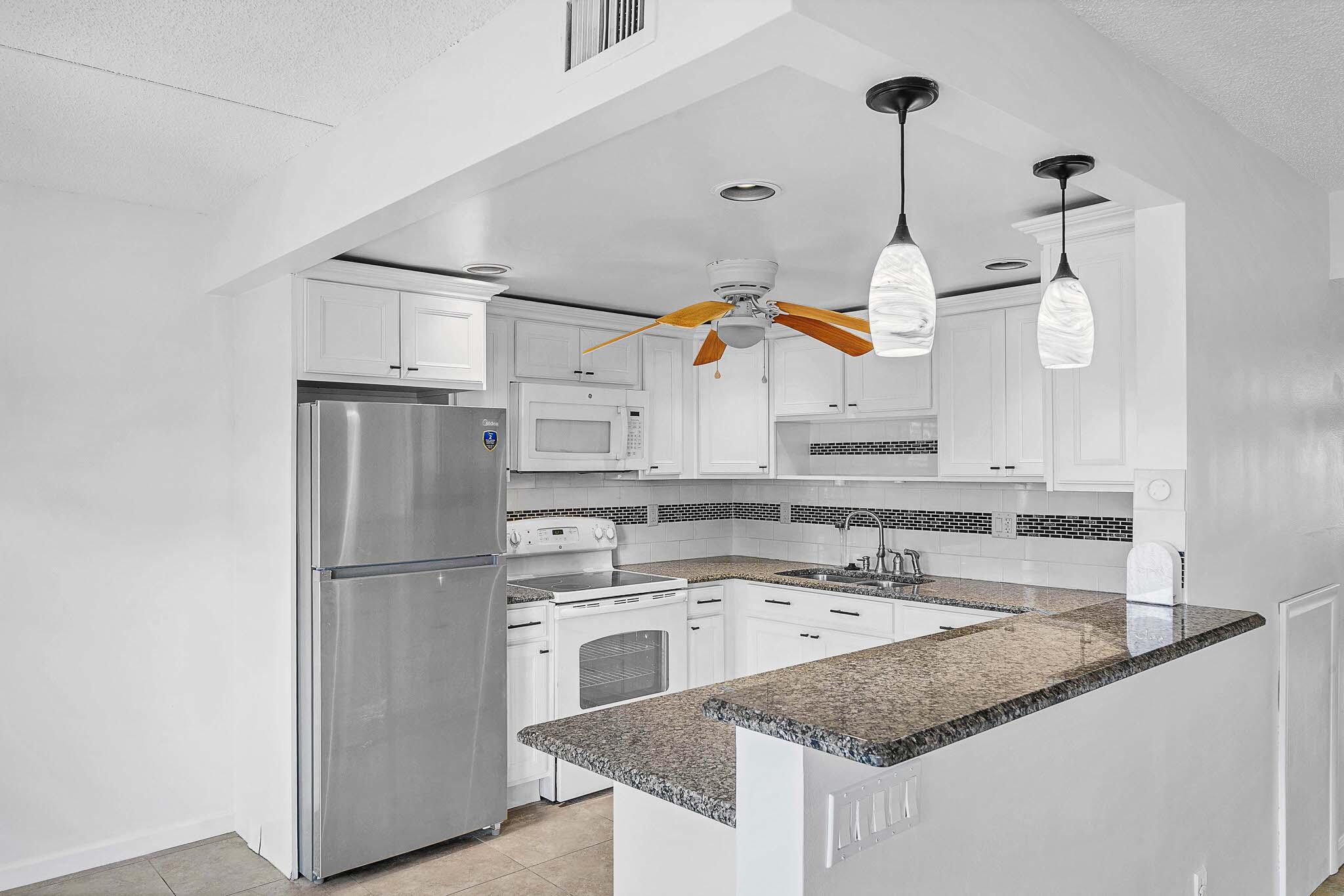 2049 Hythe A Boca Raton, FL 33434 - Photo 8 of 38 5 Kitchen (2)