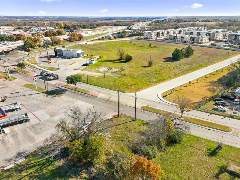 401 East Malloy Bridge Road Seagoville, TX 75159 - Photo 11 of 14 a view of a swimming pool with a lounge chair