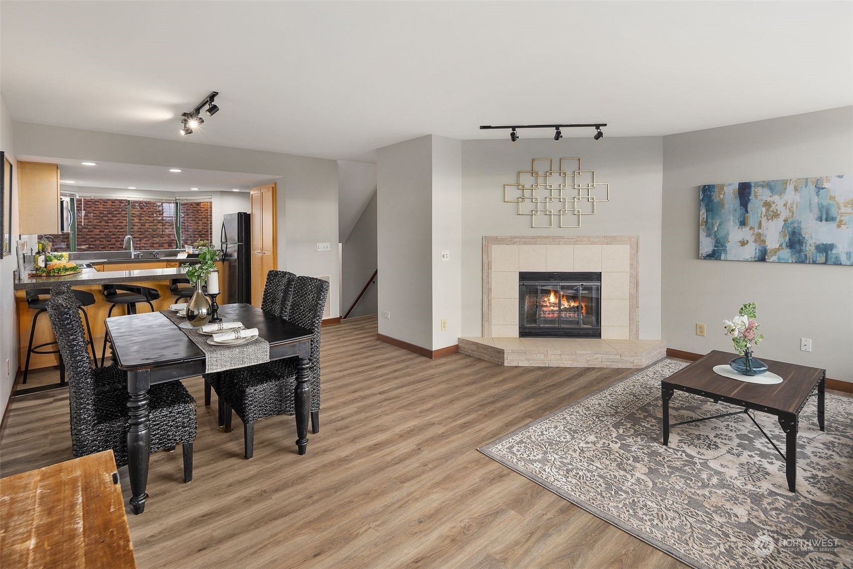 416 Daley Street, Unit C Edmonds, WA 98020 - Photo 11 of 38 a view of a dining room with furniture window and wooden floor