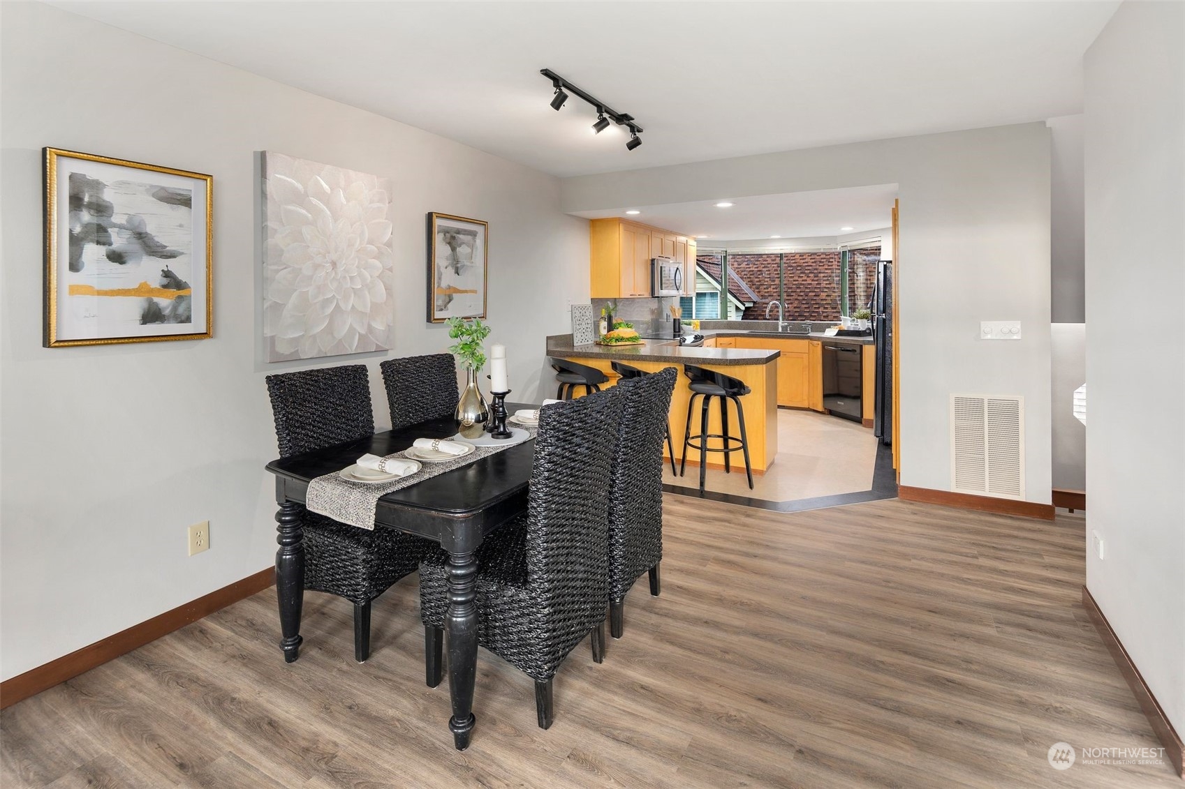 416 Daley Street, Unit C Edmonds, WA 98020 - Photo 12 of 38 a view of a dining room with furniture and wooden floor