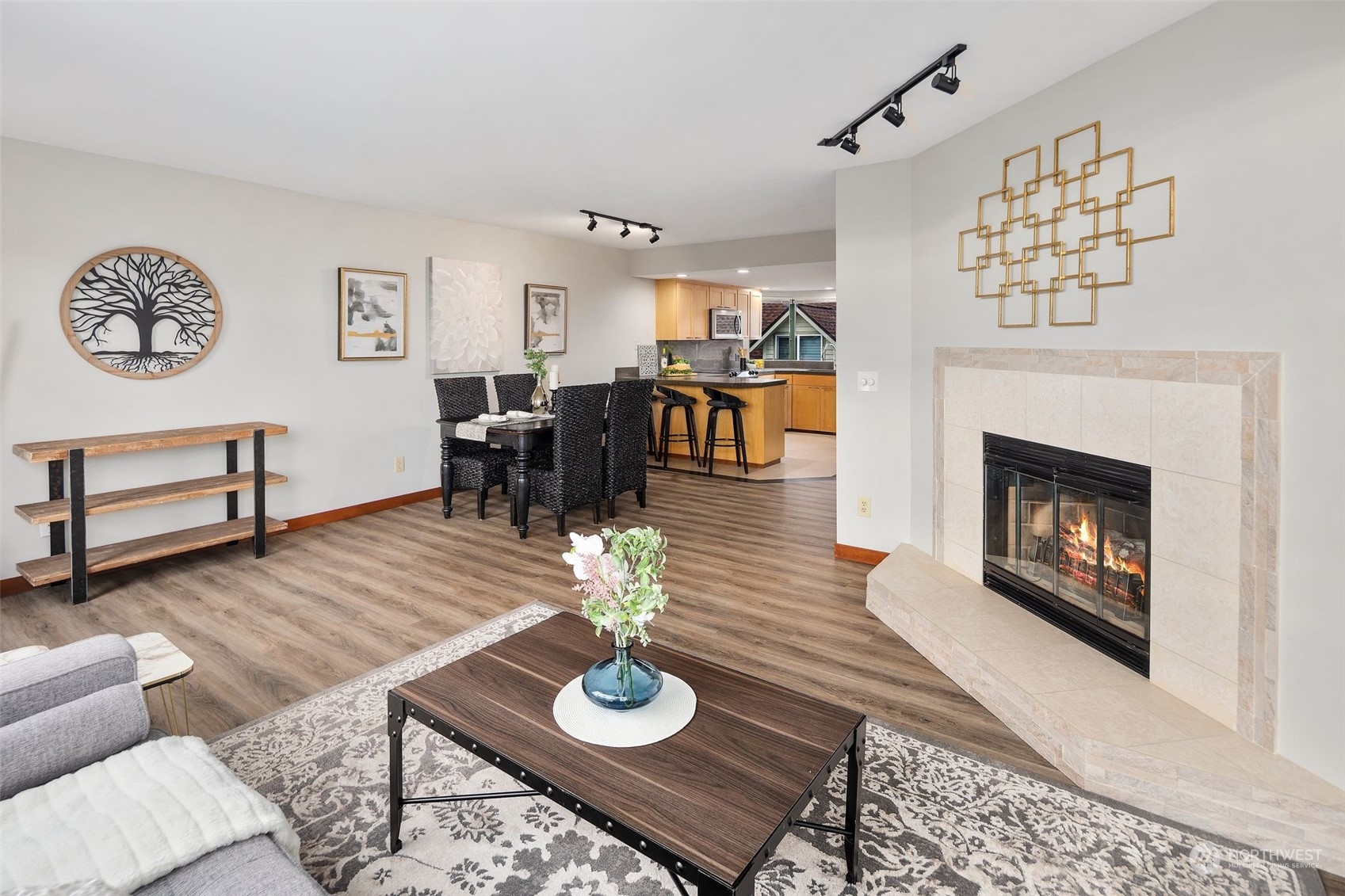 416 Daley Street, Unit C Edmonds, WA 98020 - Photo 13 of 38 a living room with furniture and a fireplace with wooden floor